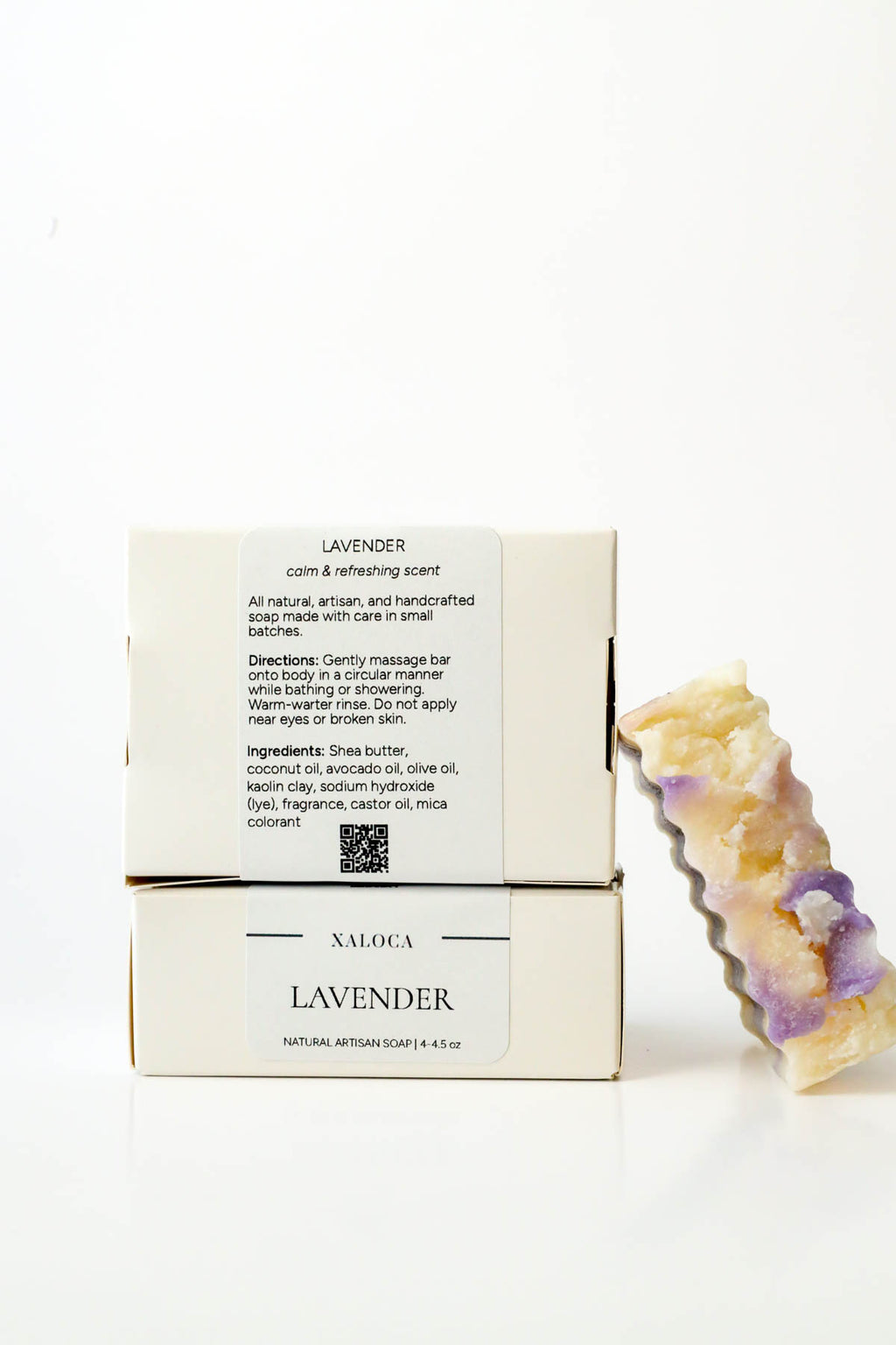 Lavender soap bar with packaging on a white background