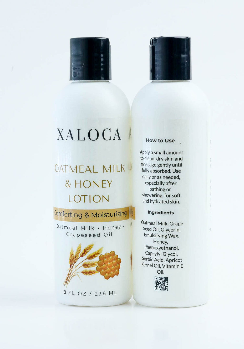 Two bottles of Xaloca Oatmeal Milk & Honey Lotion on a white background