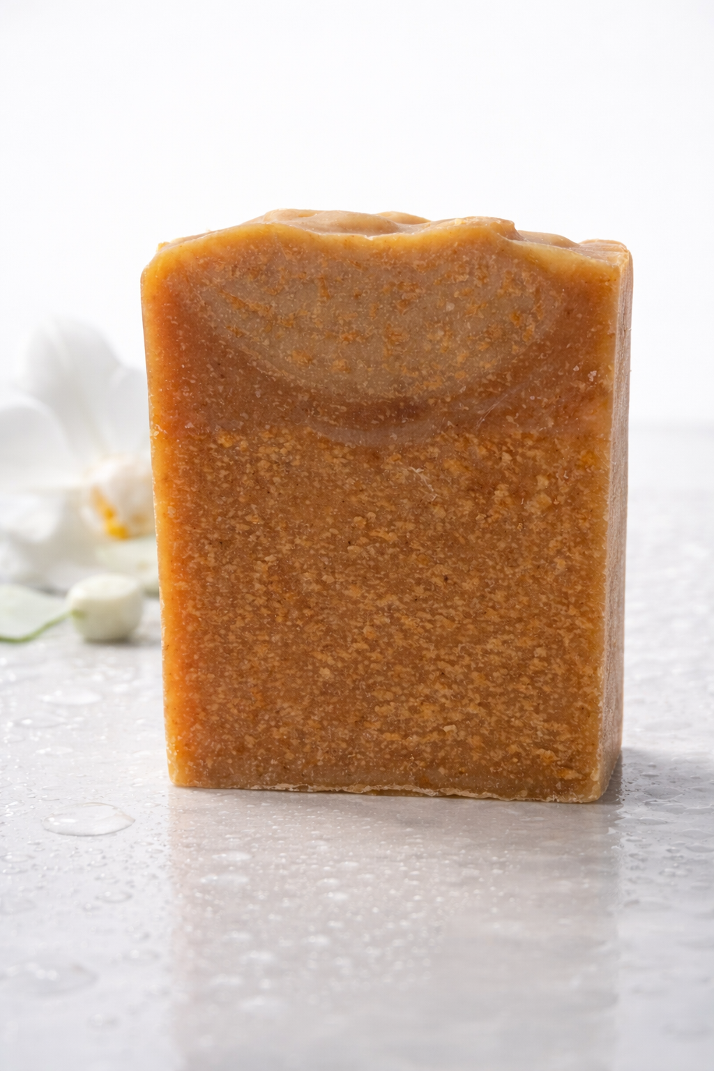 Brown bar of soap on a white background